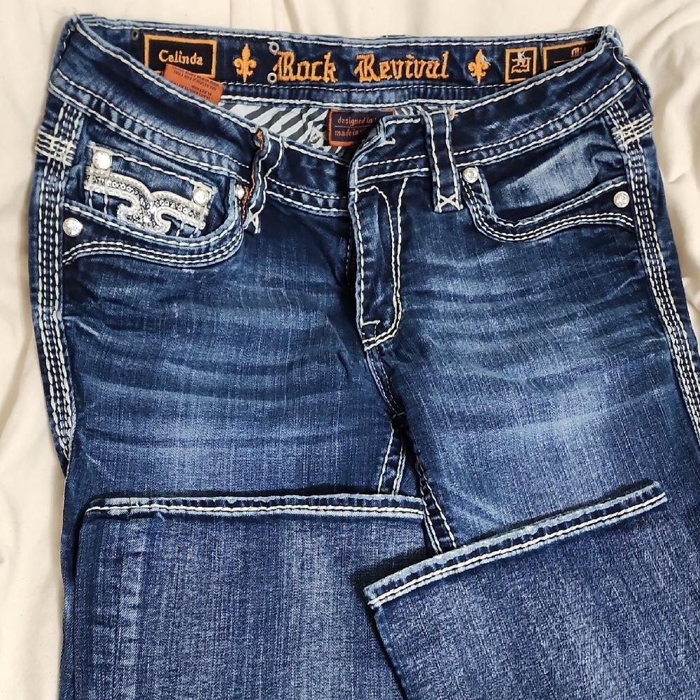 Rock Revival Blue Boot Cut Jeans with Classic Fading